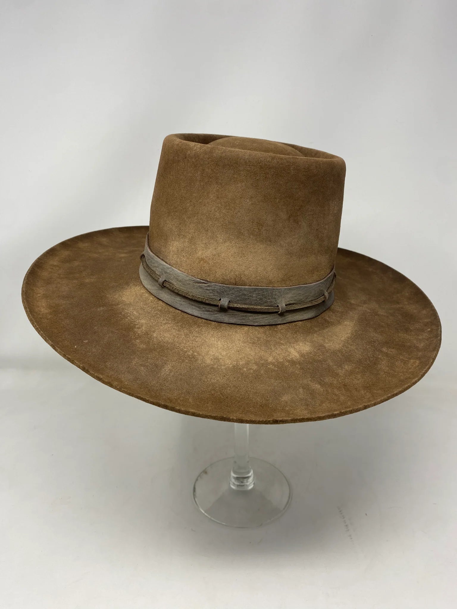 Handmade Spencer Dutton hat from the 1923 series in dark brown beaver felt with an outer laced leather band.