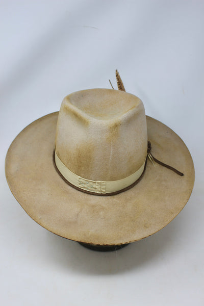 Front view of the LH Blond Pinch hat by Lone Hawk Hats featuring blond fur blend felt, a mid-size pinched crown, hand-stitched band, and light distressing.