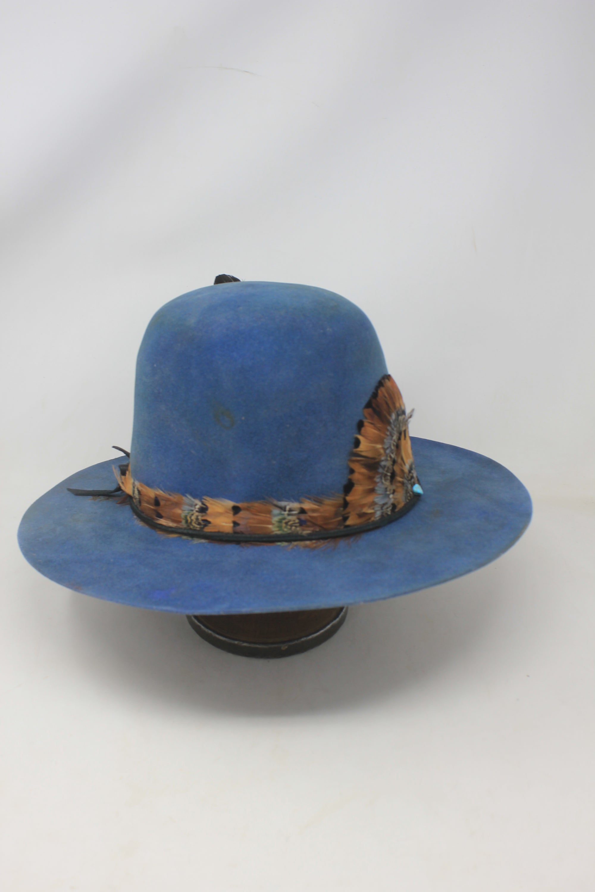 Right view of the LH Open Crown Feather Band hat by Lone Hawk Hats featuring royal blue fur blend felt, an open crown, medium brim, and handmade feather banding.