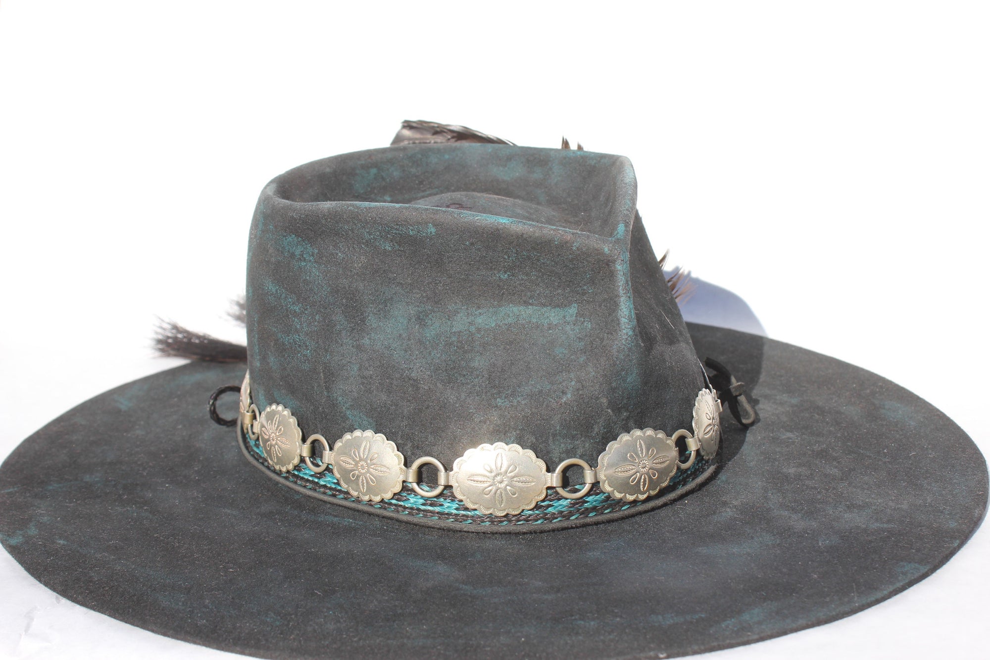 close up right view of the Plum Crazy hat by Lone Hawk Hats featuring hand-dyed purple vintage beaver felt, an open crown, and a hand-beaded floral band.