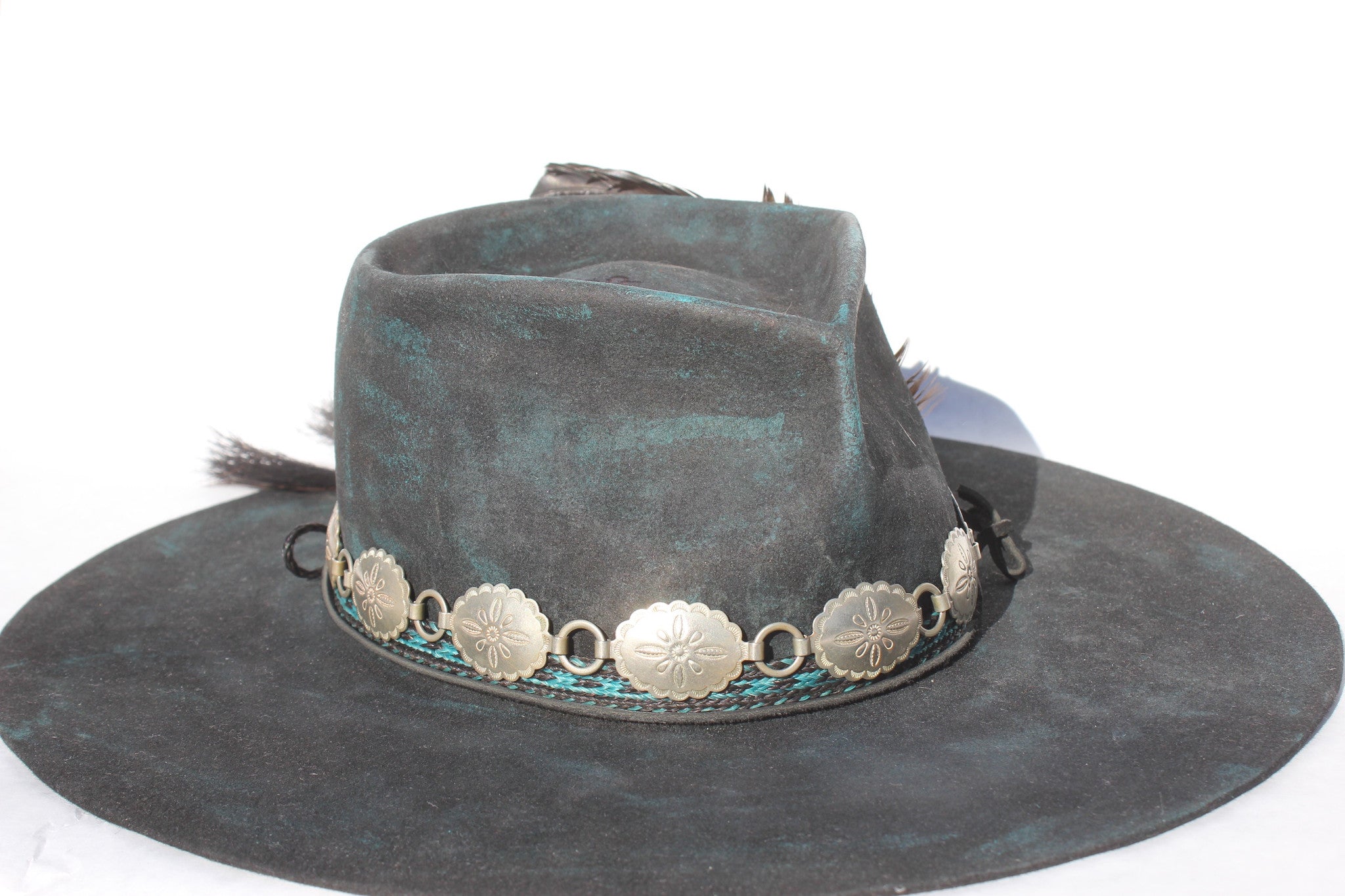 close up right view of the Plum Crazy hat by Lone Hawk Hats featuring hand-dyed purple vintage beaver felt, an open crown, and a hand-beaded floral band.