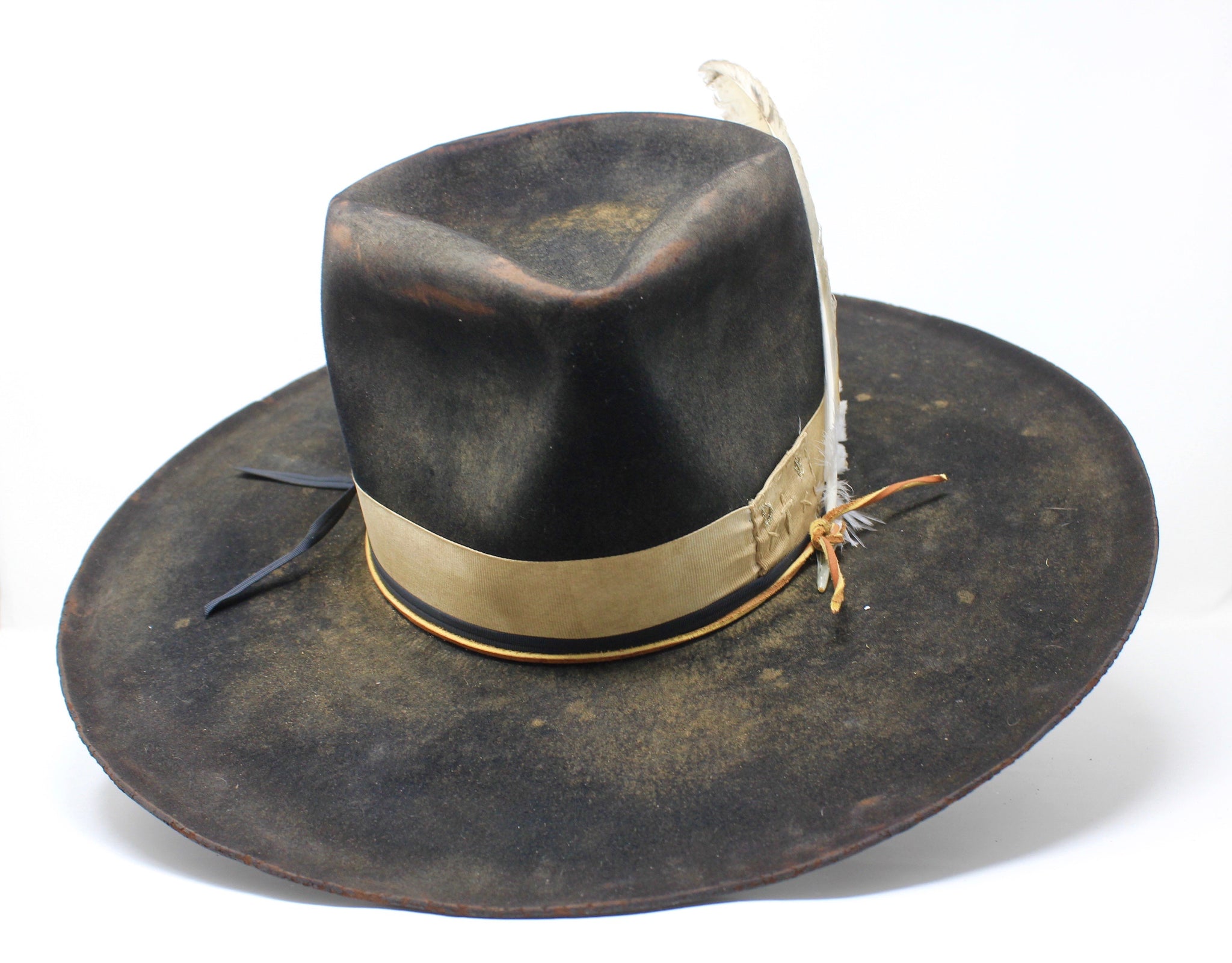 Handmade Night Hawk western hat by Lone Hawk Hats, crafted in distressed beaver felt with hand-stitched banding, one-of-a-kind design.