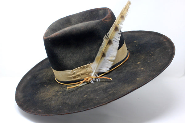 Handmade Night Hawk western hat by Lone Hawk Hats, crafted in distressed beaver felt with hand-stitched banding, one-of-a-kind design.