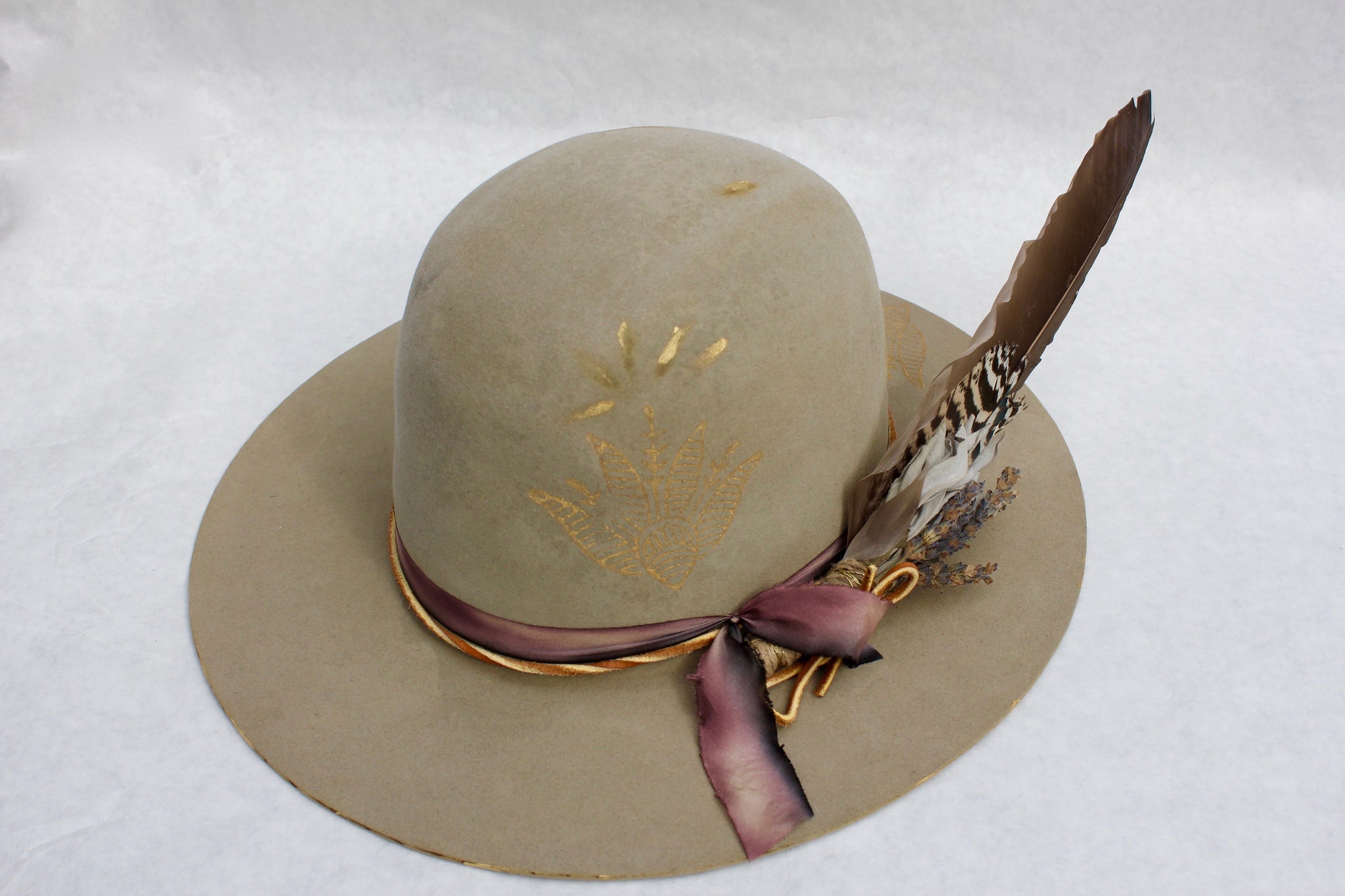 Top left view of the Block Print Open Crown hat by Lone Hawk Hats featuring antique Indian wood block prints, hand-painted gold accents, hand-dyed silk ribbon, and a classic open crown design.