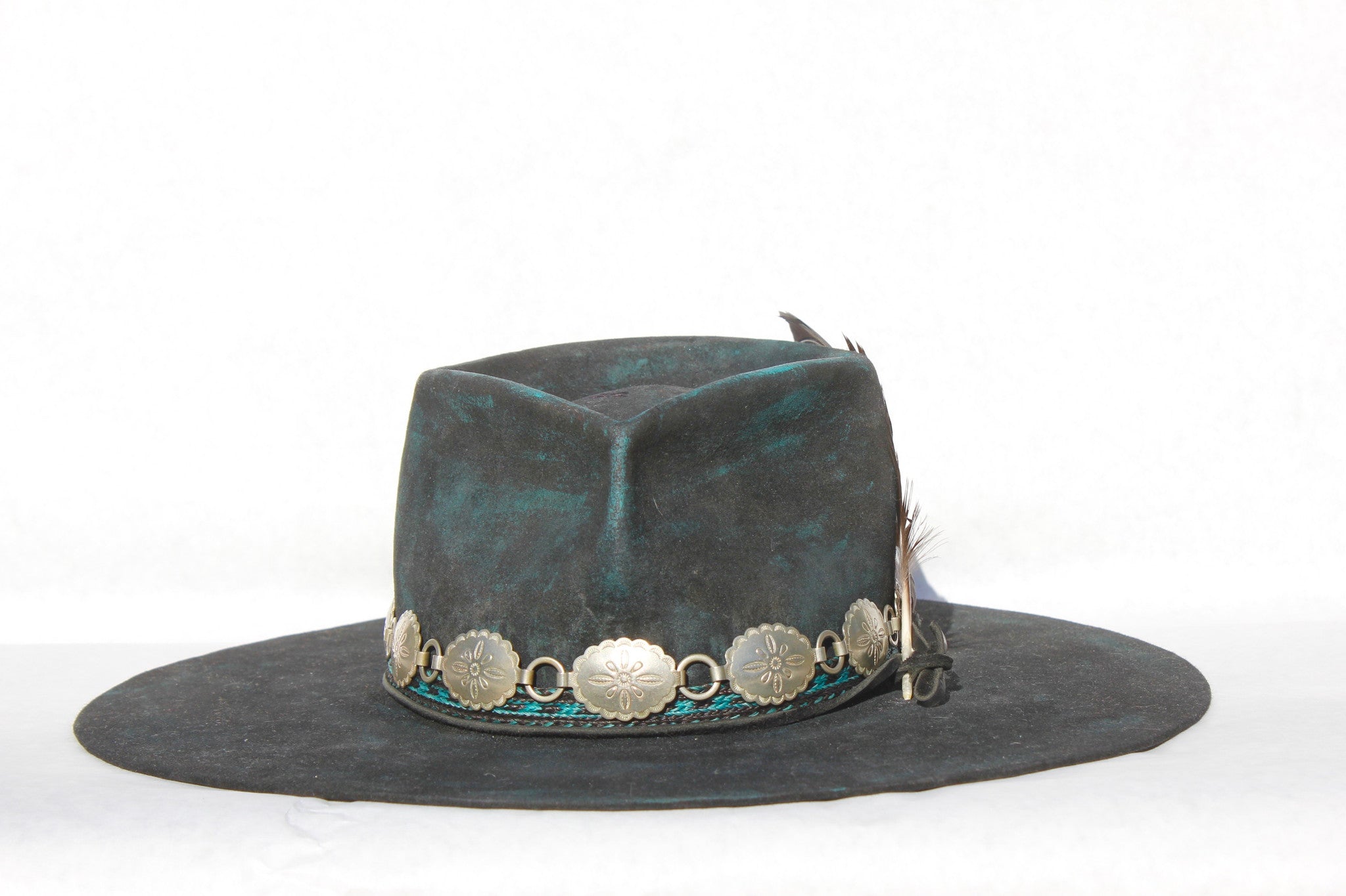 Front view of the Plum Crazy hat by Lone Hawk Hats featuring hand-dyed purple vintage beaver felt, an open crown, and a hand-beaded floral band.